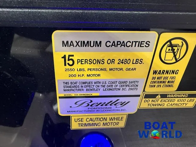 Slide: The Image of 2025 Bentley Pontoons Legacy 223 capacity label, 15 persons or 2480 lbs, safety warnings. - 17
