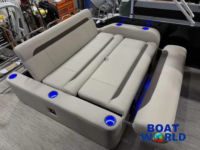 Slide: The Image of Luxurious seating on 2025 Bentley Pontoons Legacy 223 Swingback Tritoon with blue LED cup holders. - 22