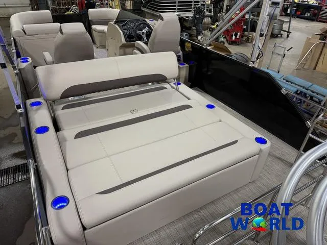 Slide: The Image of 2025 Bentley Pontoons Legacy 223 Tritoon interior with luxurious seating and modern design. - 23