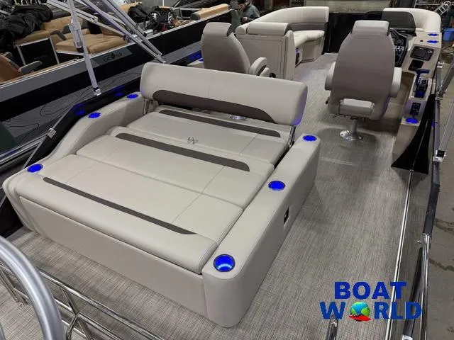 Slide: The Image of 2025 Bentley Pontoons Legacy 223 Tritoon interior with luxurious seating and modern design. - 24