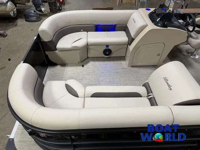 Slide: The Image of 2025 Bentley Pontoons Legacy 223 Swingback Tritoon interior with luxurious seating and modern console. - 3