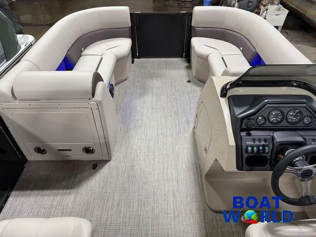 Slide: The Image of 2025 Bentley Pontoons Legacy 223 Swingback Tritoon interior with modern dashboard and seating. - 31