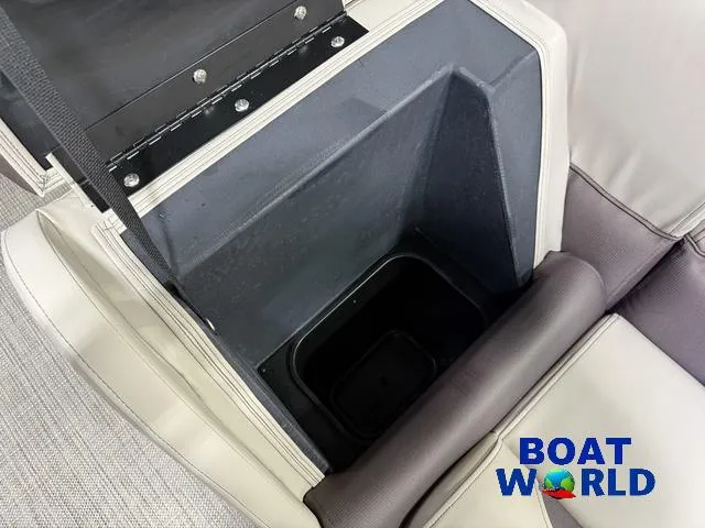 Slide: The Image of 2025 Bentley Pontoons Legacy 223 Swingback Tritoon seat storage compartment, featuring durable construction. - 35