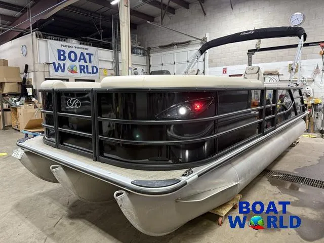 Slide: The Image of 2025 Bentley Pontoons Legacy 223 Swingback Tritoon in showroom, featuring Honda 4-Stroke EFI engine. - 40