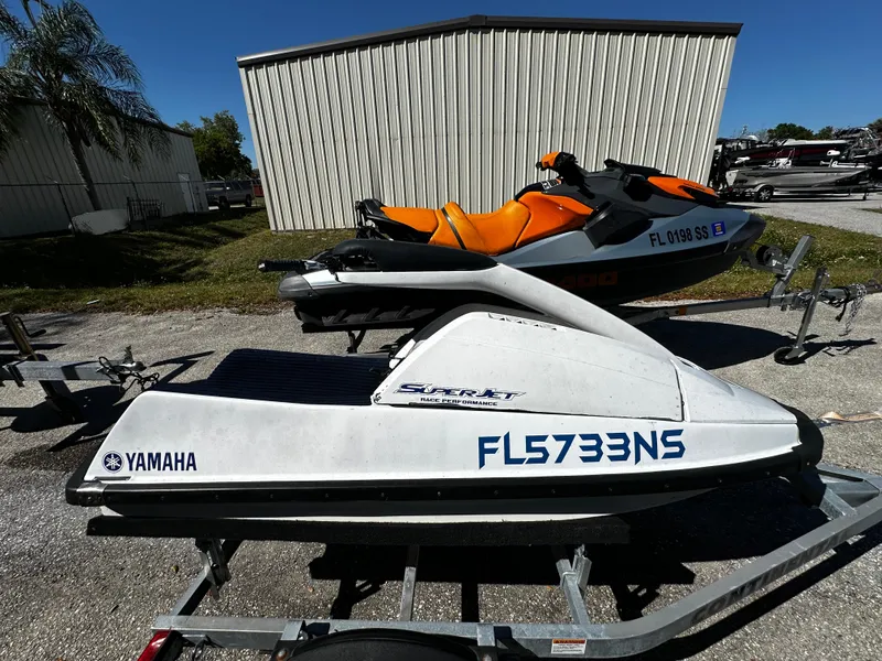 Slide: The Image of 1991 Yamaha WaveRunner Super Jet on trailer, parked outdoors. - 11
