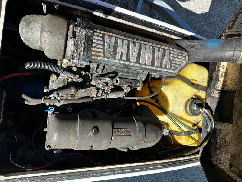 Slide: The Image of 1991 Yamaha WaveRunner Super Jet engine compartment with visible components and fuel tank. - 13