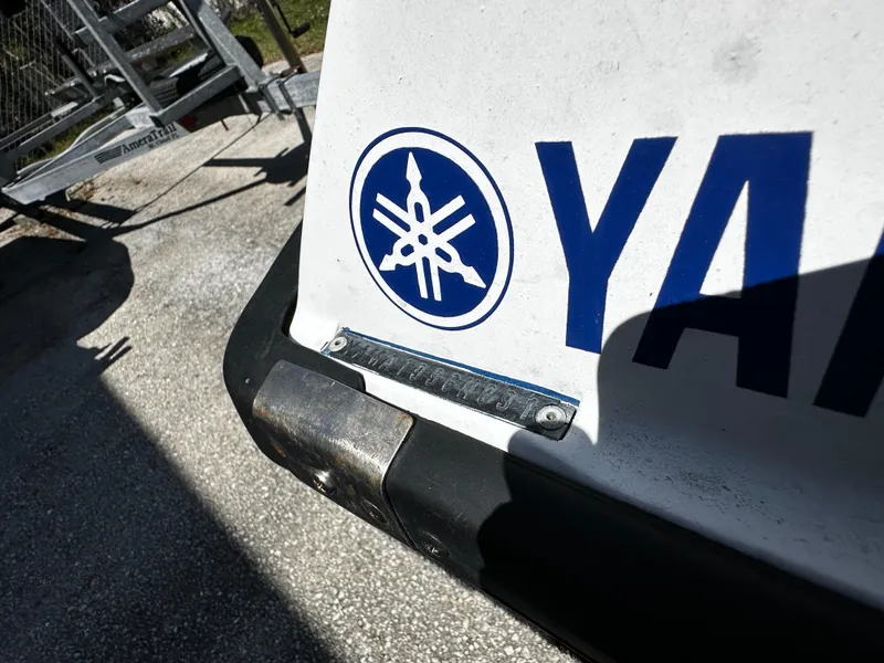 Slide: The Image of 1991 Yamaha WaveRunner Super Jet logo and partial name on a white surface. - 4