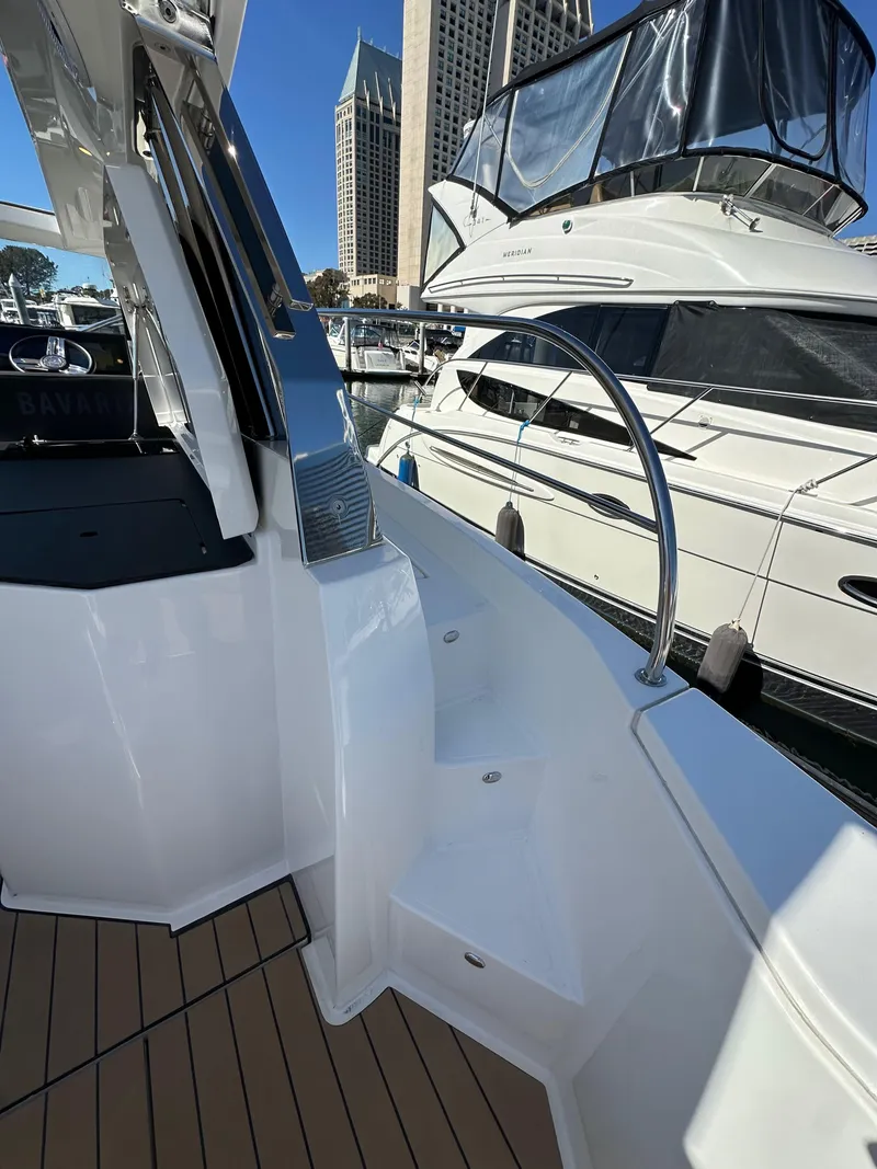 Slide: The Image of 2023 Bavaria SR36 yacht docked, showcasing sleek design and modern features. - 21