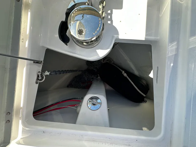 Slide: The Image of Anchor compartment of 2023 Bavaria SR36 boat with chain and fender. - 28