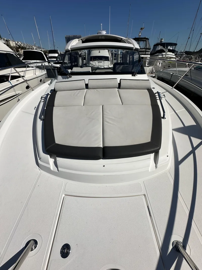 Slide: The Image of 2023 Bavaria SR36 yacht with sunbathing deck, docked in marina. - 29