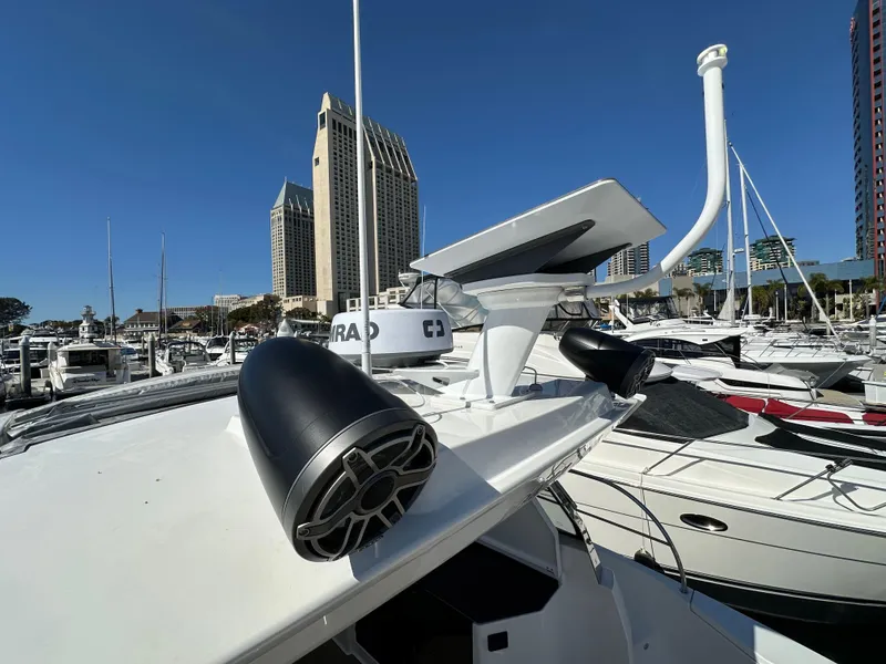 Slide: The Image of 2023 Bavaria SR36 yacht with modern radar and speakers docked in a marina. - 33