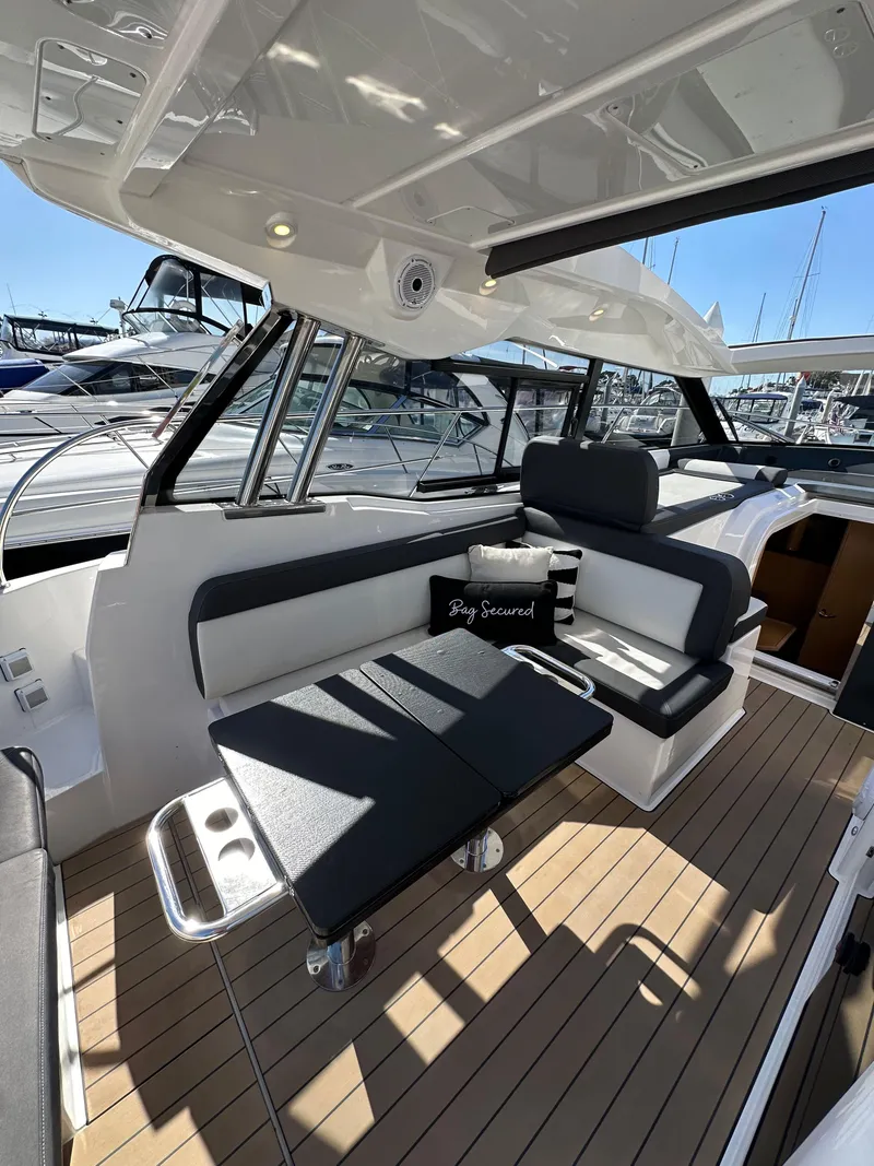 Slide: The Image of 2023 Bavaria SR36 yacht interior with sleek seating and modern design. - 35