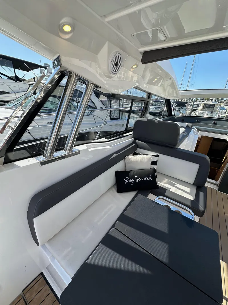 Slide: The Image of 2023 Bavaria SR36 yacht interior with sleek seating and modern design. - 37