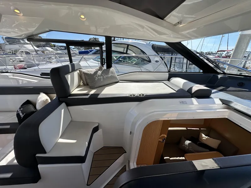 Slide: The Image of Interior of 2023 Bavaria SR36 yacht with modern seating and sleek design. - 49