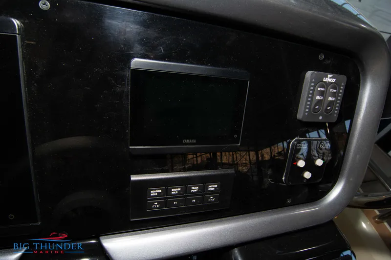 Slide: The Image of 2024 Invictus GT370S dashboard featuring Yamaha display and Lenco controls. - 31
