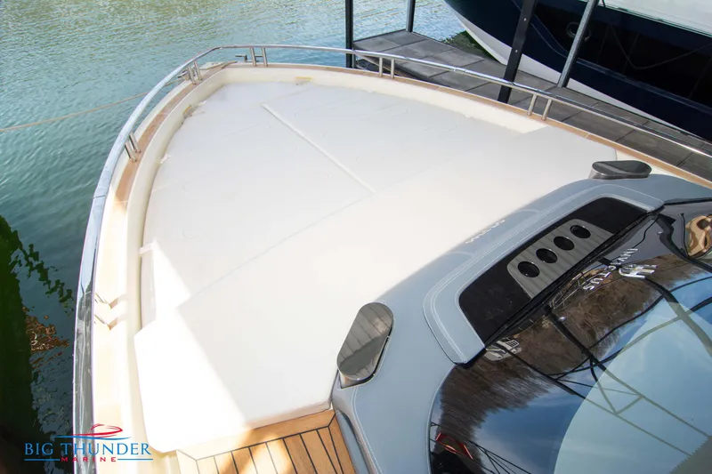 Slide: The Image of 2024 Invictus GT370S yacht deck with sleek design and modern features. - 46