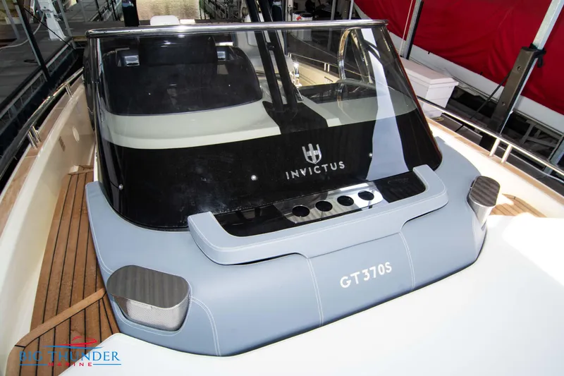 Slide: The Image of 2024 Invictus GT370S yacht with sleek design and modern features. - 49