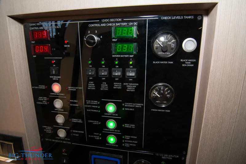 Slide: The Image of Control panel of 2024 Invictus GT370S boat, featuring battery and tank level indicators. - 57