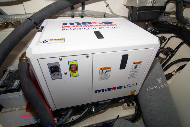 Slide: The Image of 2024 Invictus GT370S engine room with Mase generator, labeled "Believing in Change." - 60