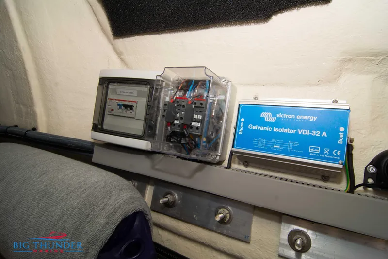 Slide: The Image of Electrical components in a 2024 Invictus GT370S, featuring a Victron Energy Galvanic Isolator. - 61