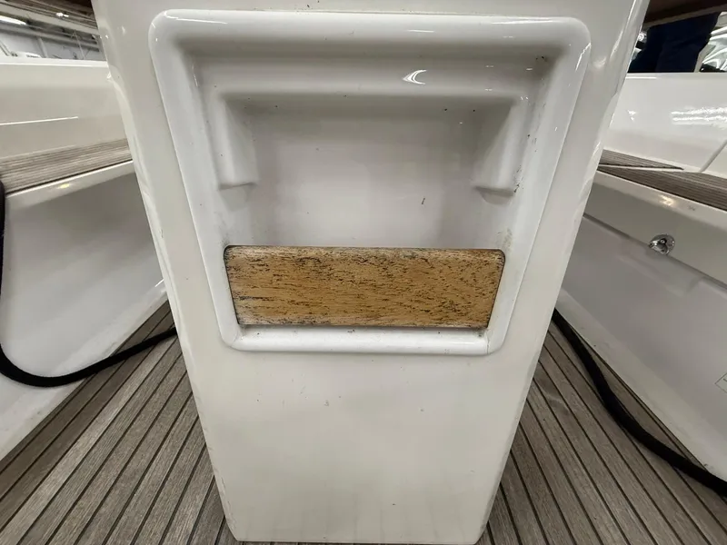 Slide: The Image of Beneteau Oceanis 38.1 cockpit detail, 2017 model, featuring teak accents and white fiberglass. - 20