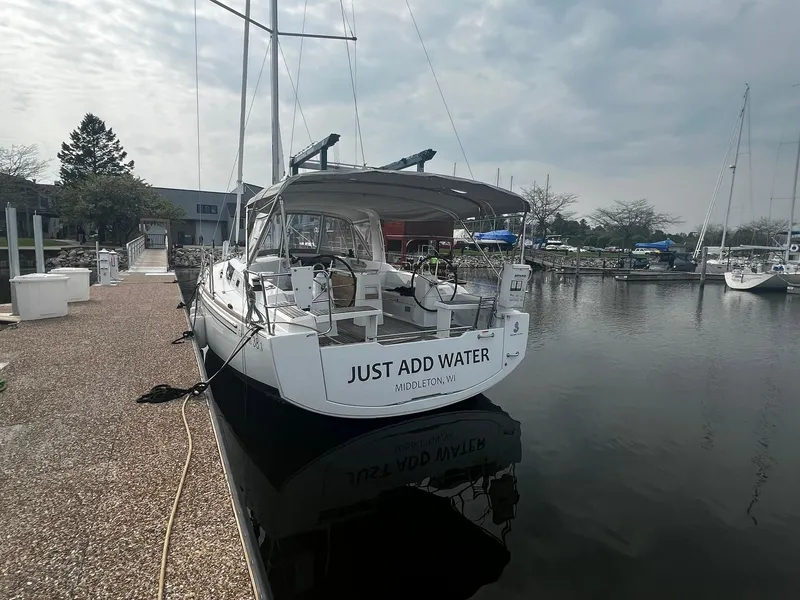 Slide: The Image of Beneteau Oceanis 38.1 sailboat docked at marina, overcast sky, 2017 model. - 3