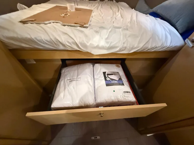 Slide: The Image of Bed with storage drawer in 2017 Beneteau Oceanis 38.1 yacht cabin. - 37