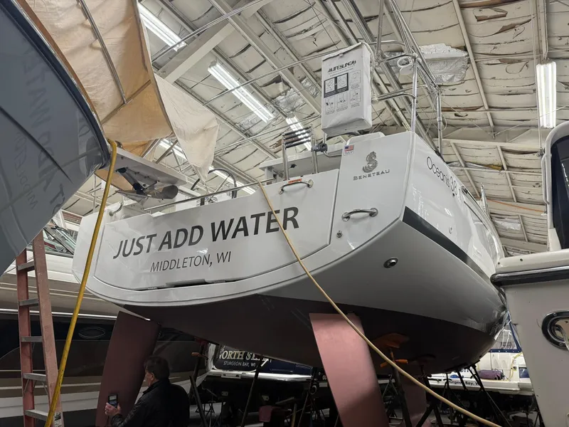 Slide: The Image of Beneteau Oceanis 38.1 sailboat in a boatyard, named "Just Add Water," Middleton, WI. - 7