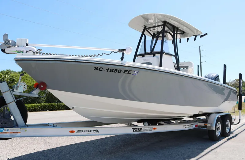 Slide: The Image of 2023 Pathfinder 2400TRS boat on trailer, side view, sunny day. - 0