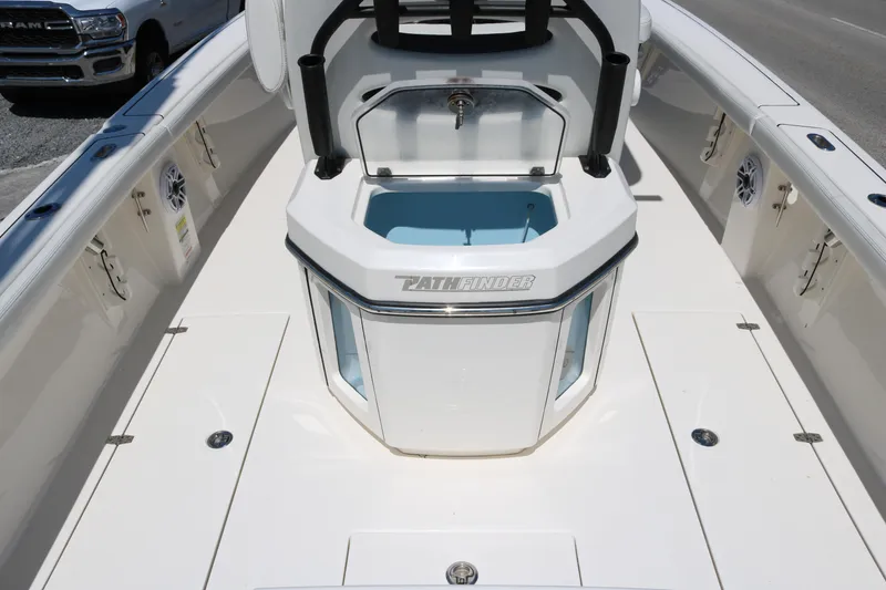 Slide: The Image of 2023 Pathfinder 2400TRS boat interior with open storage compartment. - 12