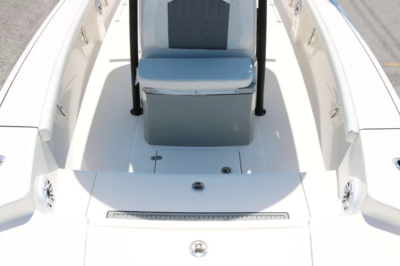 Slide: The Image of 2023 Pathfinder 2400TRS boat interior with seating and storage. - 9