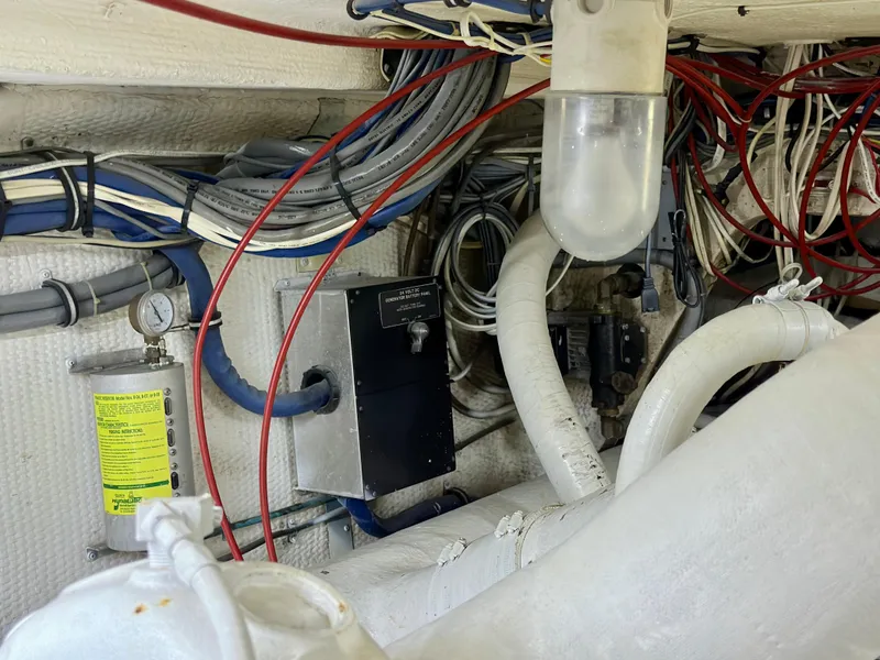 Slide: The Image of Engine room wiring and components of a 1994 Hatteras 46 Convertible yacht. - 47