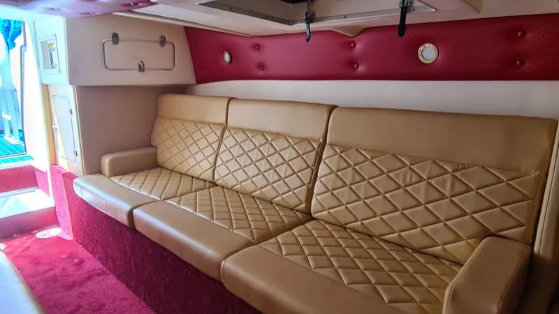 Slide: The Image of Luxurious interior of a 2000 Cigarette Tiger 42 boat with quilted leather seating. - 12