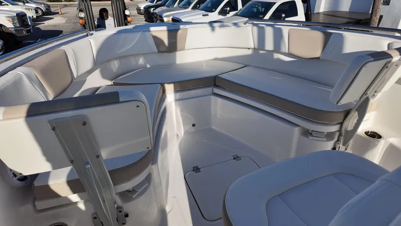 Slide: The Image of 2025 Robalo R230 boat interior with spacious seating and modern design. - 5