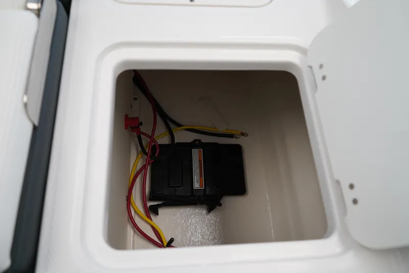 Slide: The Image of 2025 Chaparral 21 SSi OB boat seating, featuring sleek gray and white upholstery. - 13