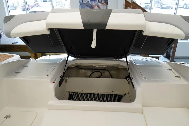 Slide: The Image of 2025 Chaparral 21 SSi OB boat seat, featuring sleek gray and white upholstery design. - 14