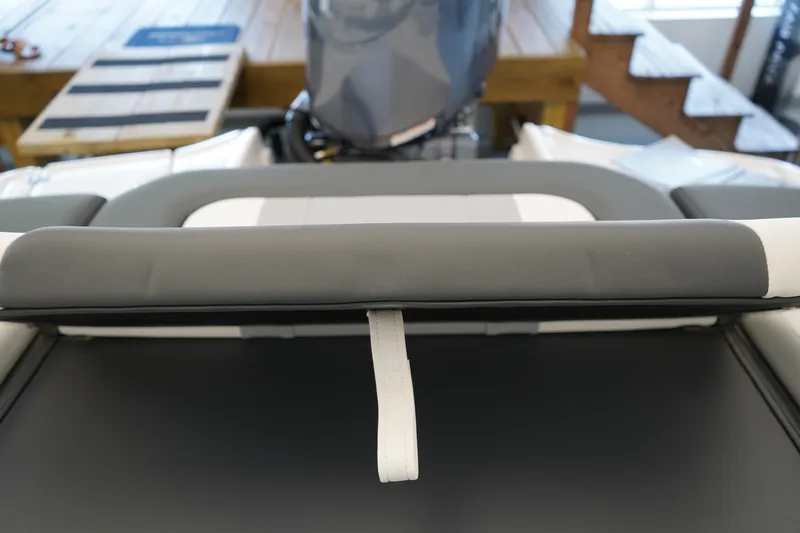 Slide: The Image of 2025 Chaparral 21 SSi OB boat interior with cushioned seating and modern design. - 3