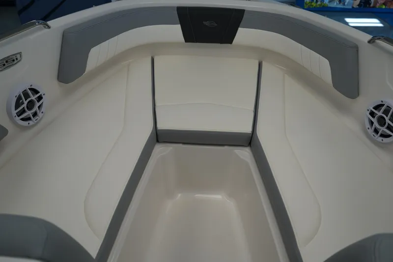 Slide: The Image of 2025 Chaparral 21 SSi OB boat interior with gray and white seating. - 36