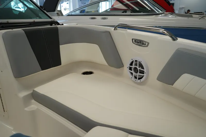 Slide: The Image of 2025 Chaparral 21 SSi OB boat hatch with metal hinges and latch. - 37