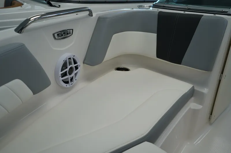 Slide: The Image of Bow storage compartment of 2025 Chaparral 21 SSi OB boat, featuring sleek design and secure latches. - 38