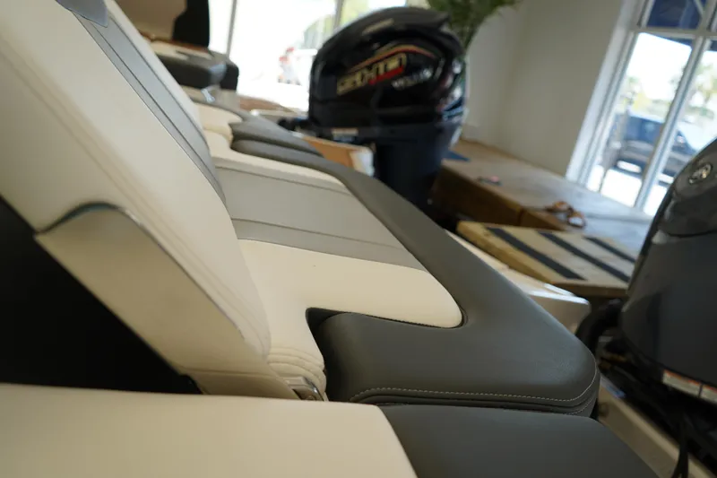 Slide: The Image of Storage compartment of 2025 Chaparral 21 SSi OB boat, open and empty. - 7