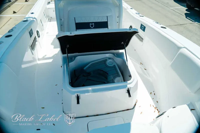 Slide: The Image of 2025 Sea Fox 268 Commander boat interior with open storage compartment. - 17