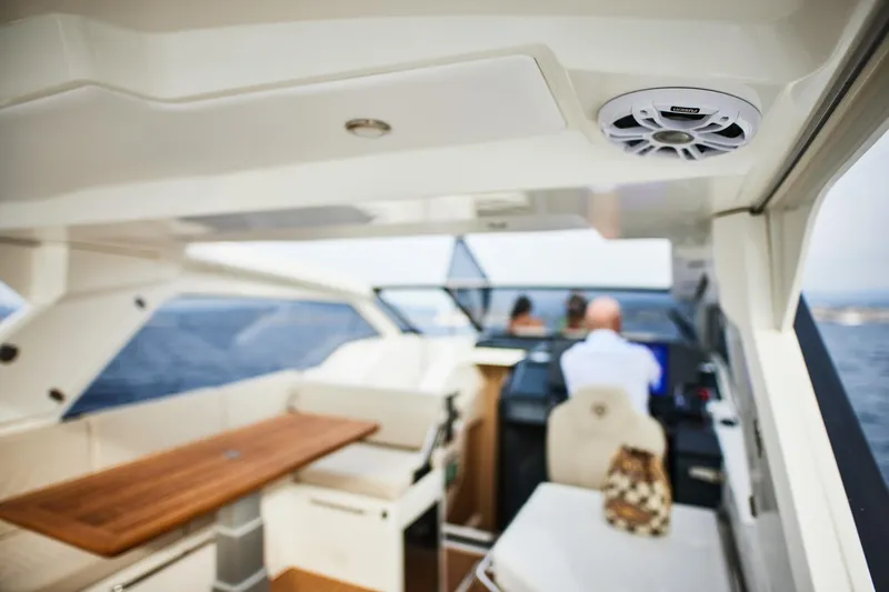 Slide: The Image of Interior of 2025 Skamander Sorrento yacht with seating and navigation area. - 4