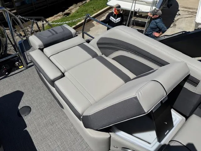 Slide: The Image of 2025 Barletta CORSA 25MA boat with luxurious gray seating and modern design. - 10