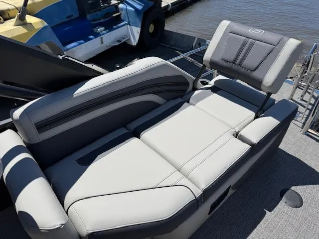 Slide: The Image of Luxurious seating on 2025 Barletta CORSA 25MA boat, featuring sleek gray upholstery. - 11