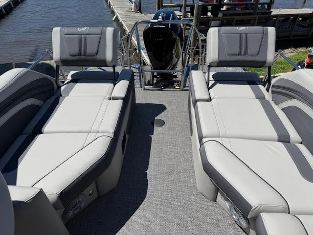 Slide: The Image of 2025 Barletta CORSA 25MA boat interior with luxurious seating and modern design. - 8