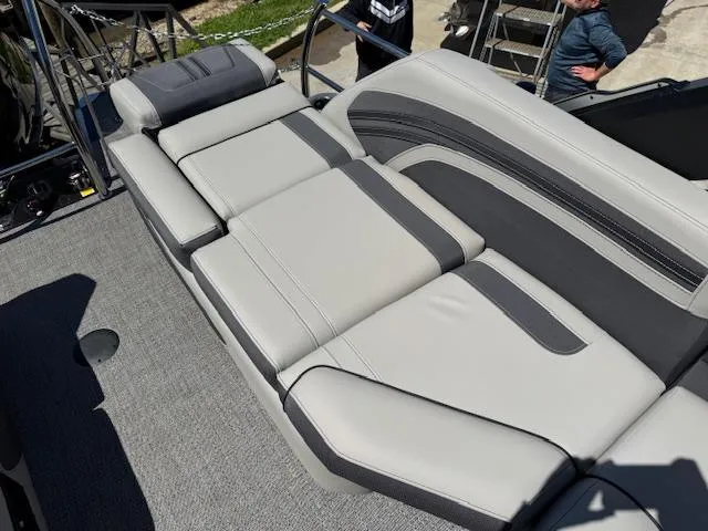 Slide: The Image of Luxurious seating on 2025 Barletta CORSA 25MA pontoon boat, featuring sleek gray upholstery. - 9