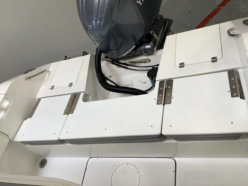 Slide: The Image of 2025 Release 210RX Center Console boat with engine and storage compartments. - 11