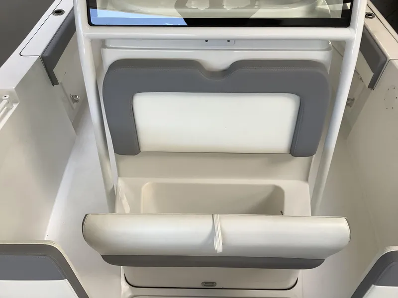 Slide: The Image of 2025 Release 210RX Center Console, featuring sleek white and gray seating design. - 25