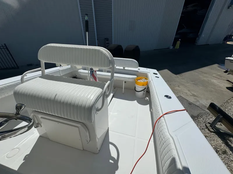 Slide: The Image of 2006 Jupiter 31 CC boat with helm station at dock. - 14